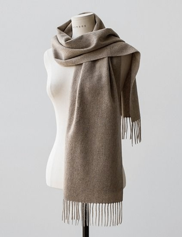 Different winter accessories recolored with WeShop AI Recolor, showing scarves, gloves, and hats in various seasonal tones.