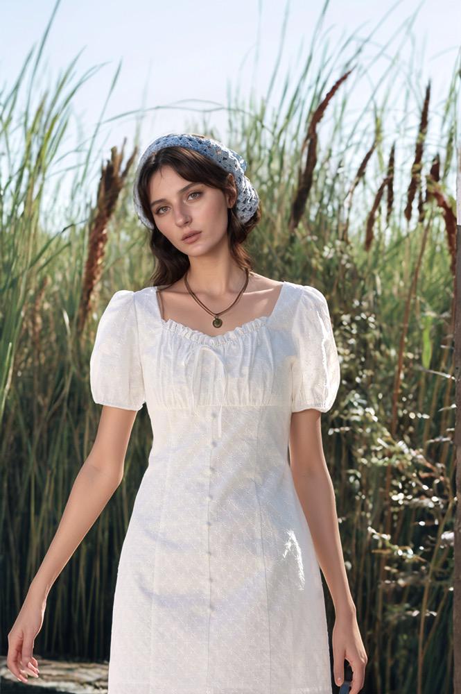 6969c6361b81e89927ba07b3_original – WeShop AI Blog Real photo of a woman in a white dress before being transformed into anime style using WeShop AI Anime Image Converter