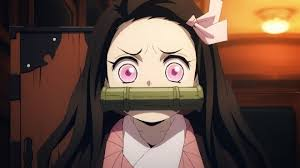 Nezuko Kamado close-up from Demon Slayer showing her iconic bamboo muzzle and expressive anime style