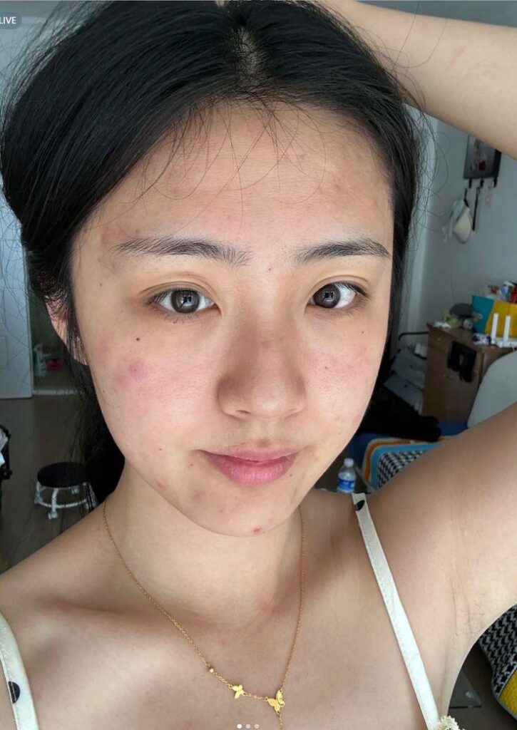 A clean, no-makeup base selfie of a person used as the target image for AI makeup application in WeShop.