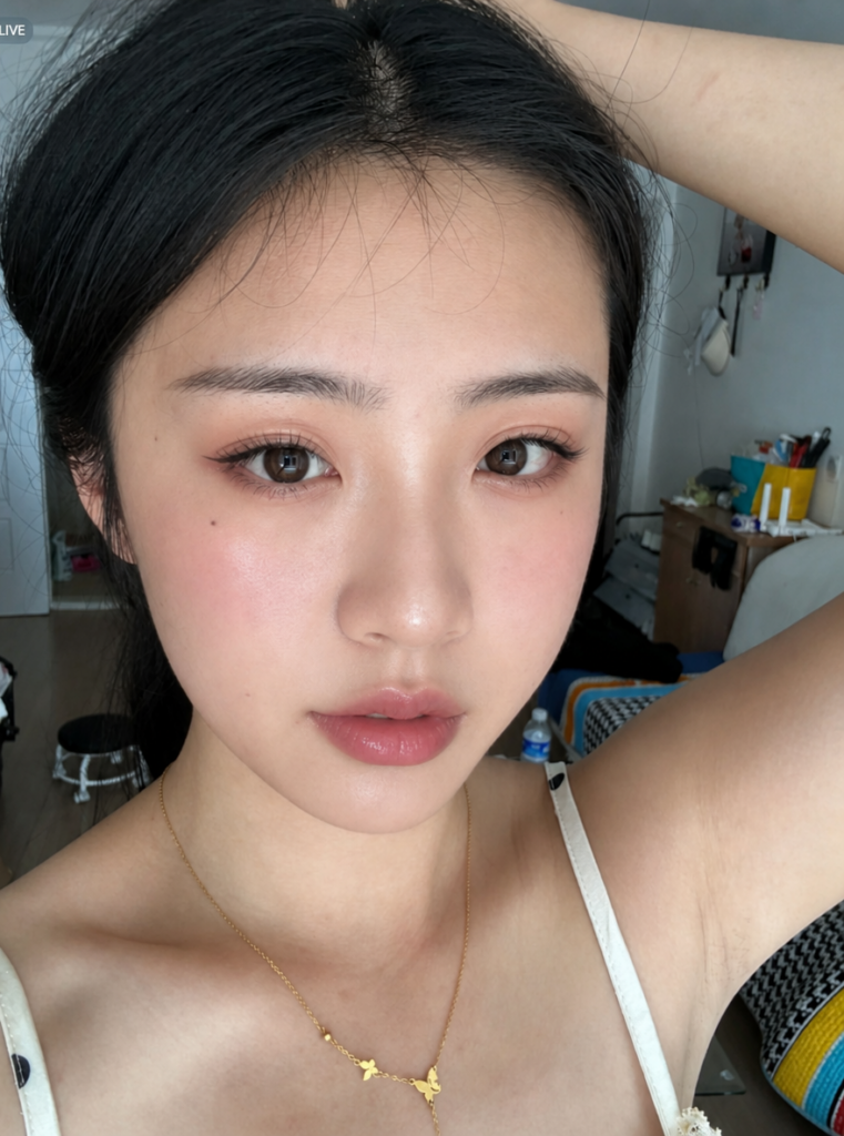 Final result of the pink idol makeup seamlessly transferred onto the selfie using GPT Image 2 in WeShop.