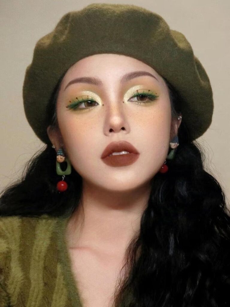 High-glam professional makeup reference with defined eyeliner and bold red lips for GPT Image 2 style mapping.