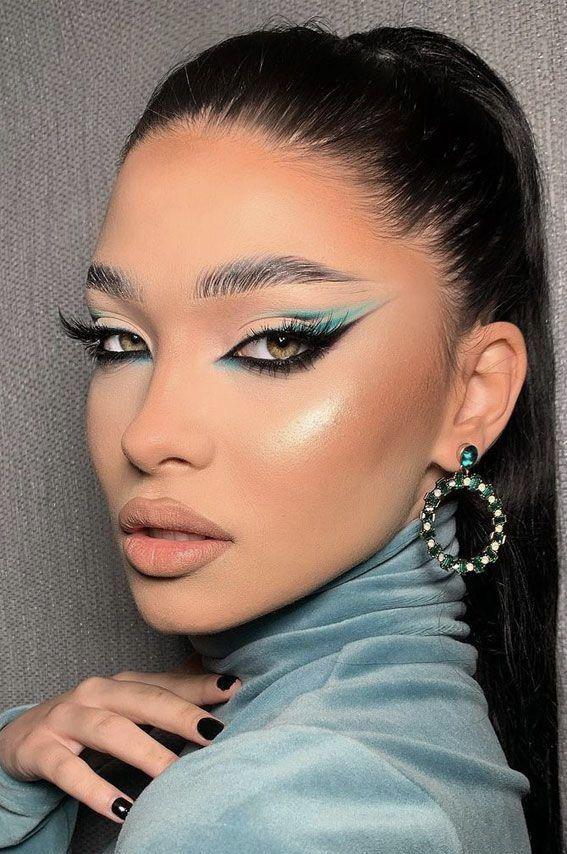 Cool-toned "cold girl" aesthetic makeup reference with soft blue eyeshadow and nude lips for GPT Image 2.