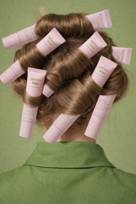 ddg – WeShop AI Blog Skincare tubes arranged in hair to show creative product visuals that can be reused for ecommerce and social media content