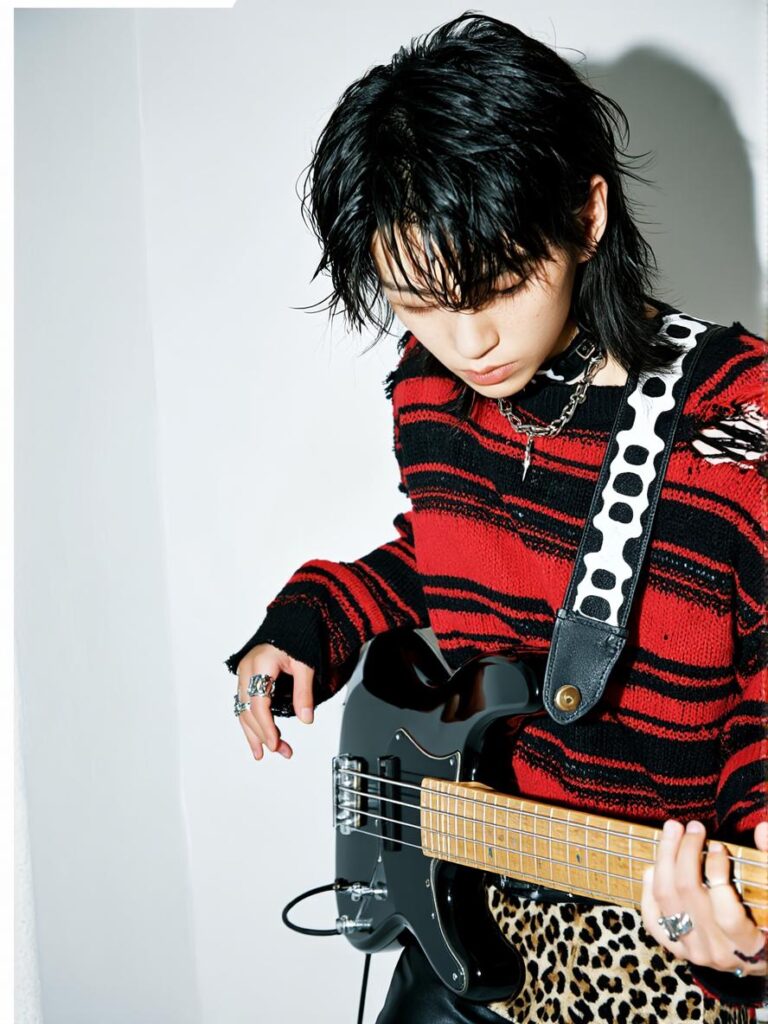 music5 – WeShop AI Blog Vertical image of a musician playing bass guitar, showing an AI-ready instrument performance visual.