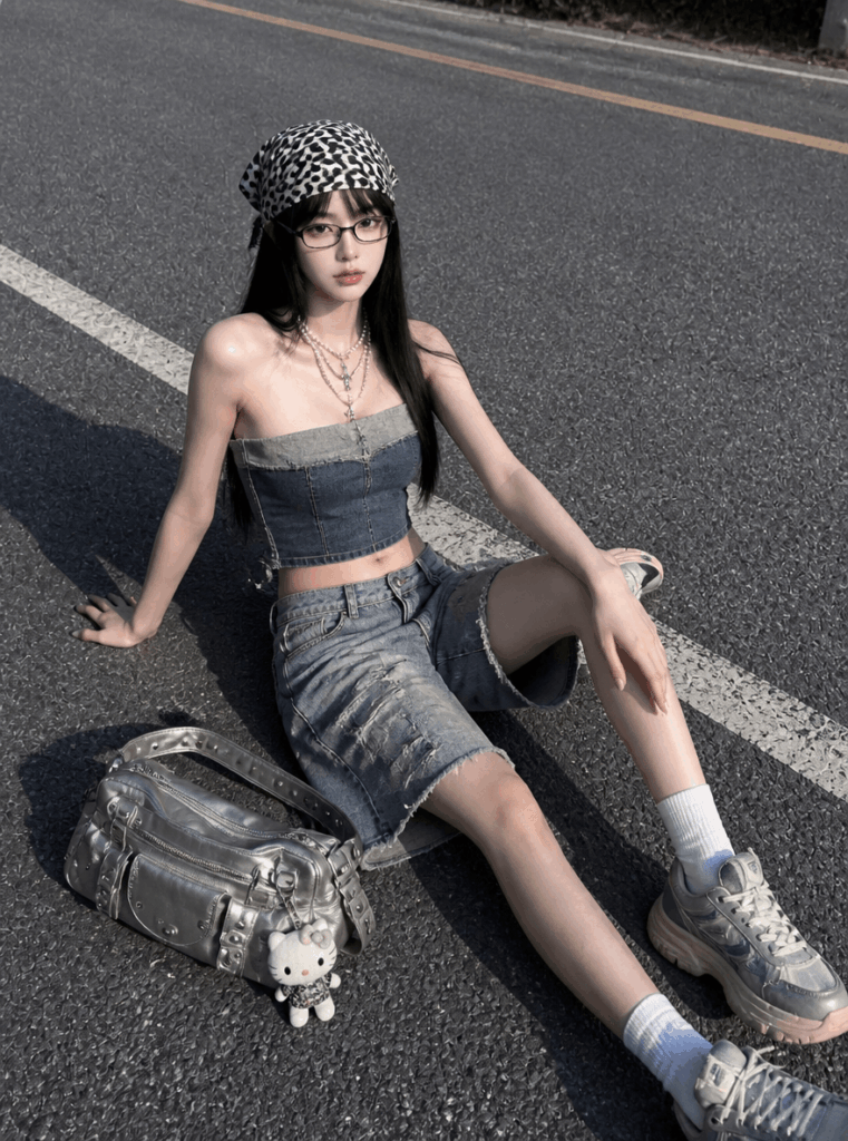 AI virtual try-on result showing a denim streetwear outfit with a bandeau top, denim skirt, sneakers, and headscarf.