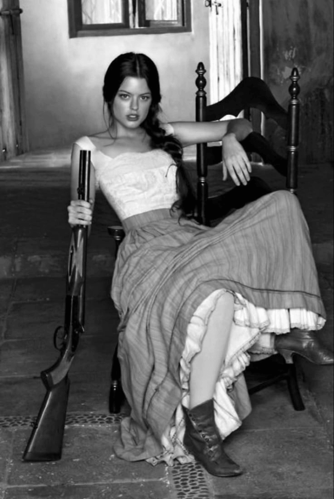 Black-and-white vintage portrait of a seated woman before AI old photo restoration