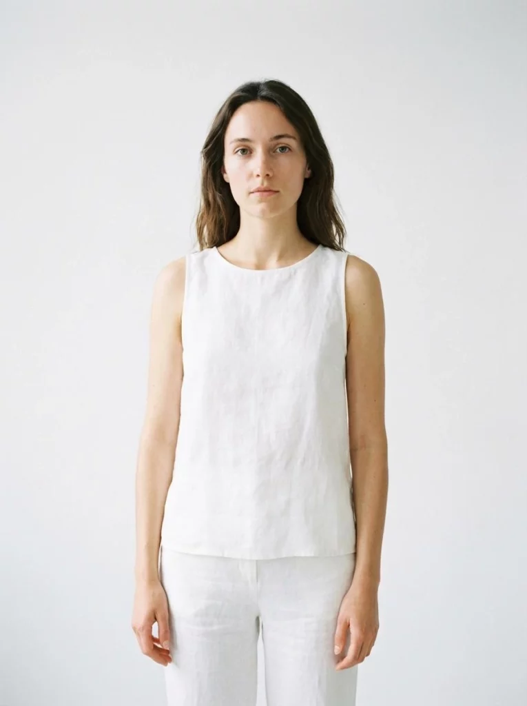 20260113_1_6d9f6261-4159-4a4d-a0a5-7e5f04b8366d_896x1200jpg_preview – WeShop AI Blog Full-body source photo of a woman in a white outfit prepared for the AI Pose Generator.