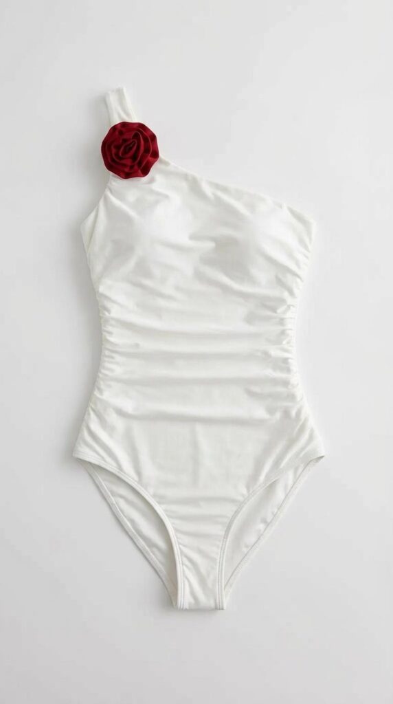 White one-shoulder bodysuit with a red rose detail prepared for an AI Outfit Changer transformation.