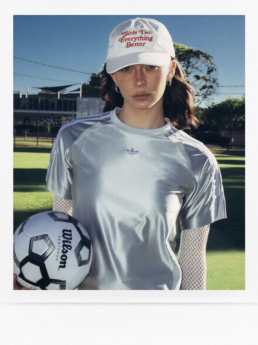 Polaroid Filter Online transforms a soccer portrait into a faded instant-film photo with soft grain and a white border.
