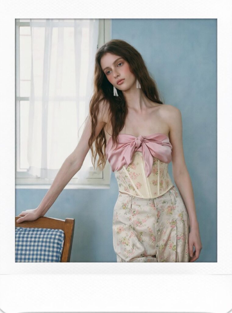 Polaroid-style portrait of a woman with a white instant photo frame created with Polaroid Filter Online.