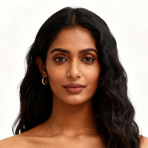 vtw – WeShop AI Blog AI fashion model with warm brown skin, long wavy black hair, and gold hoop earrings.